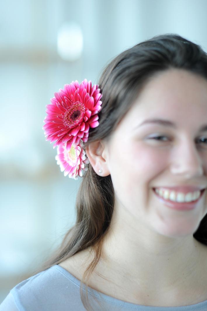 A gerbera in a lady&#039;s hair on funnyhowflowersdothat.co.uk