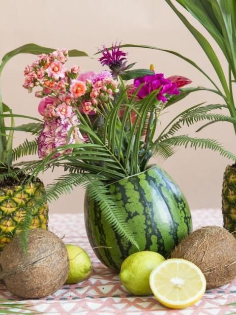 Tropical flowers in fruit vases - Funnyhowflowersdothat.co.uk